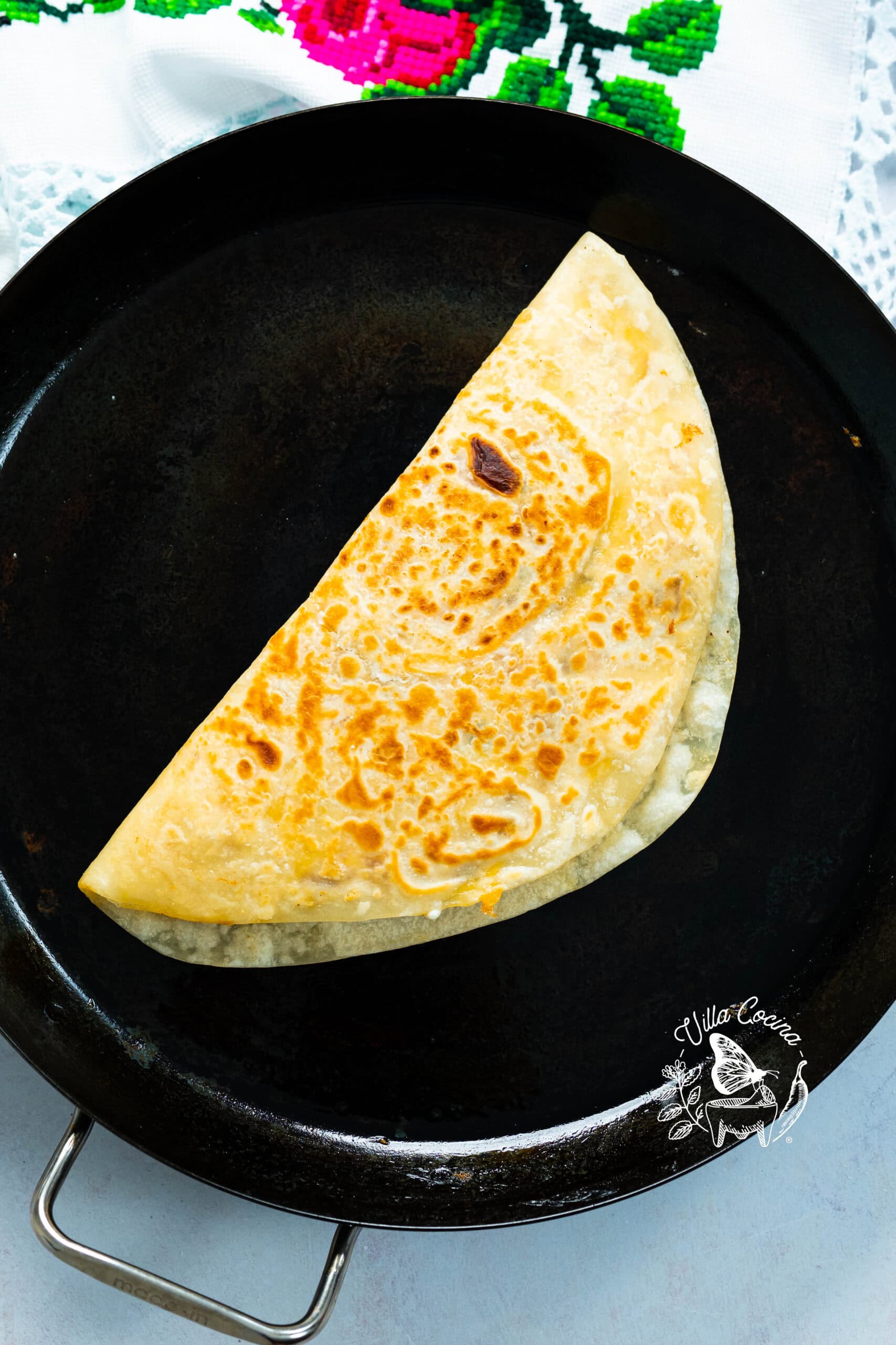 Chicken Quesadilla on a comal