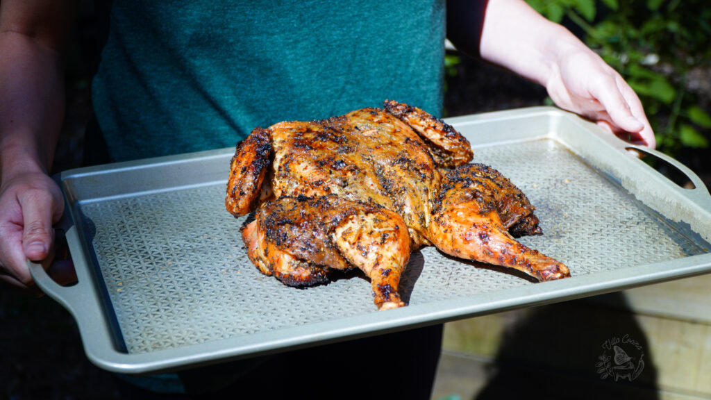 spatchcock roasted chicken in a sheet pan