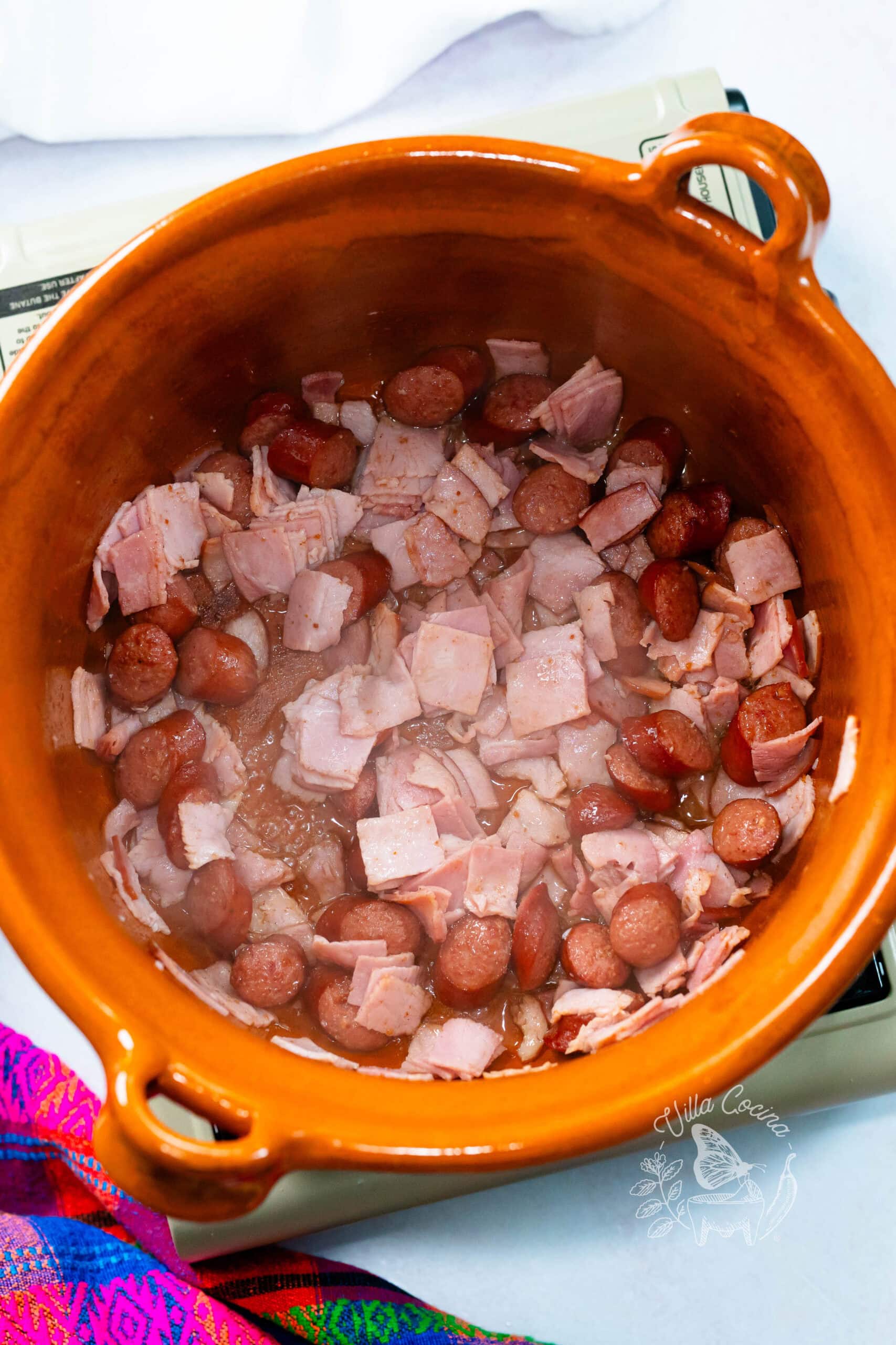 Cooking beef franks and ham for Charro Beans- Frijoles Charros