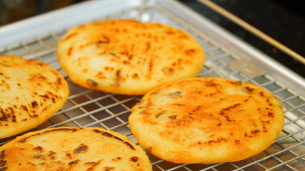 Fried round Gorditas ready for stuffing.