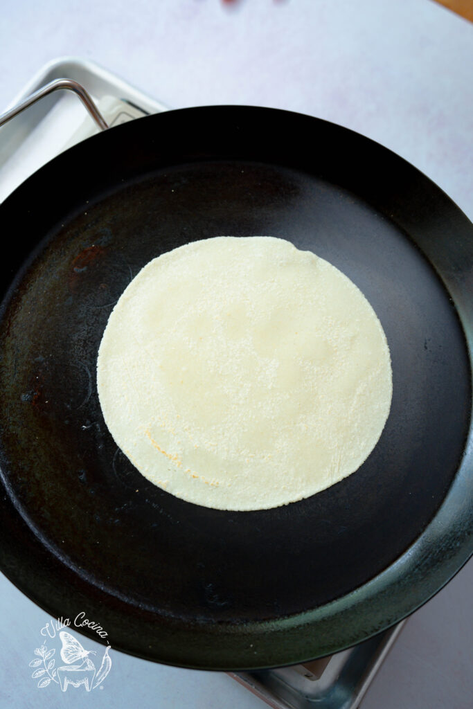 corn tortilla after first flip