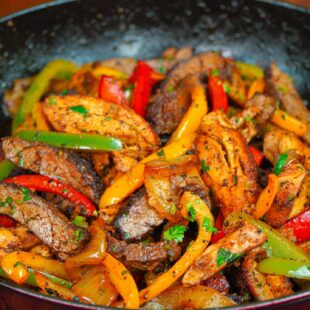 Cooked chicken and beef fajitas is an ideal dinner recipe.