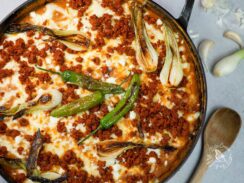 Refried beans with chorizo in safe oven pan