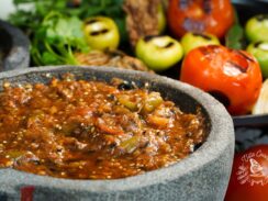 Authentic Mexican salsa with chipotle in a molcajete