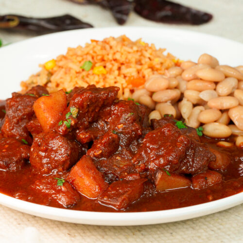 This is an image of a Chile Colorado recipe already served in a plate and ready to eat.