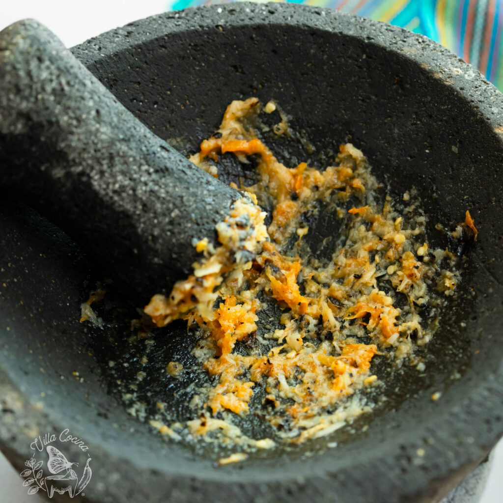 mashed pasted in a molcajete