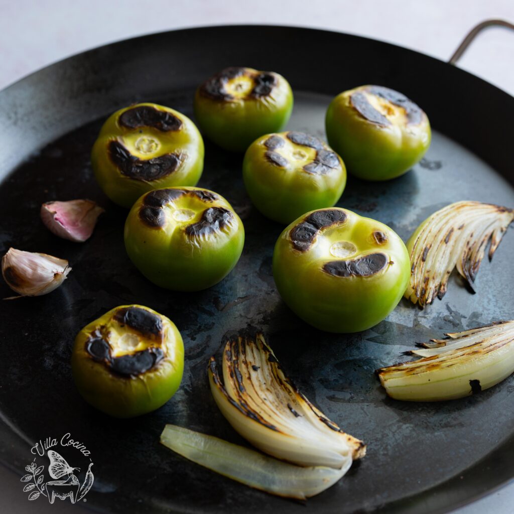 Roasted tomatillos, onions and garlic.