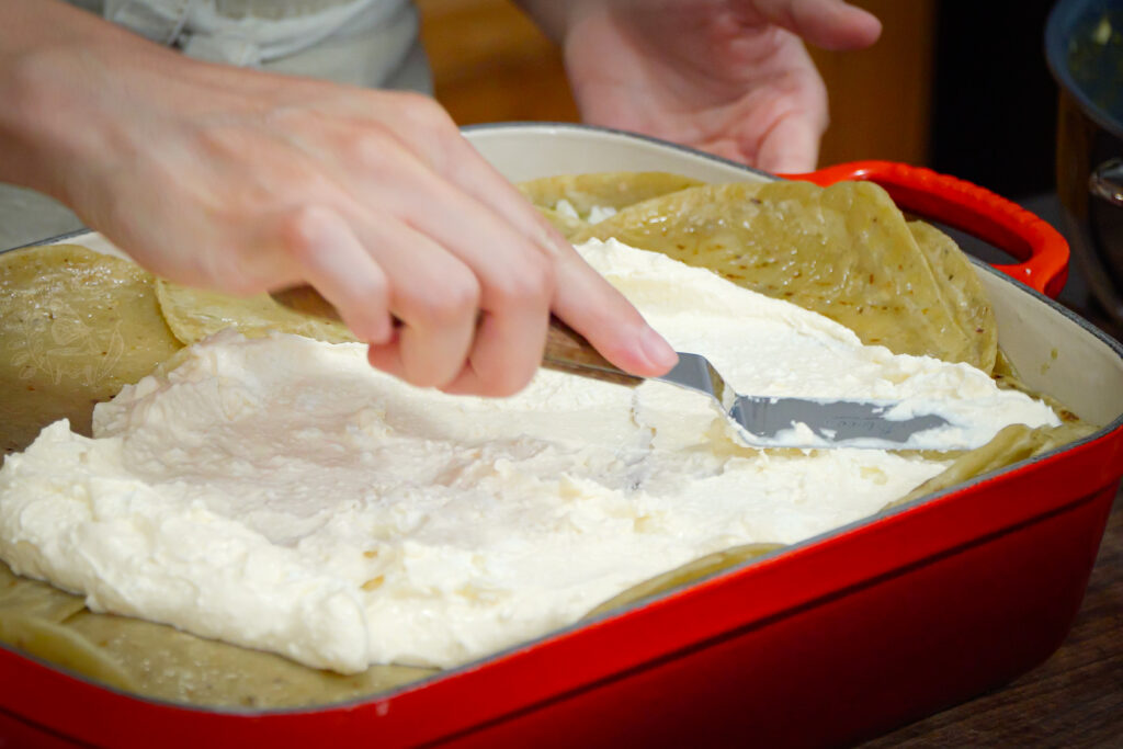 Layering on a pastel azteca or tortilla casserole