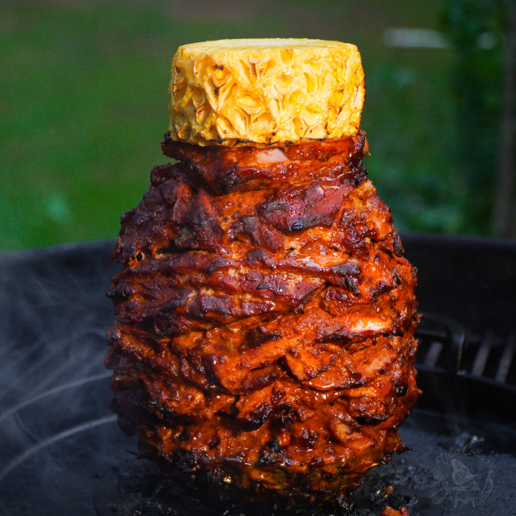 A homemade tacos al pastor recipe made on a weber grill.