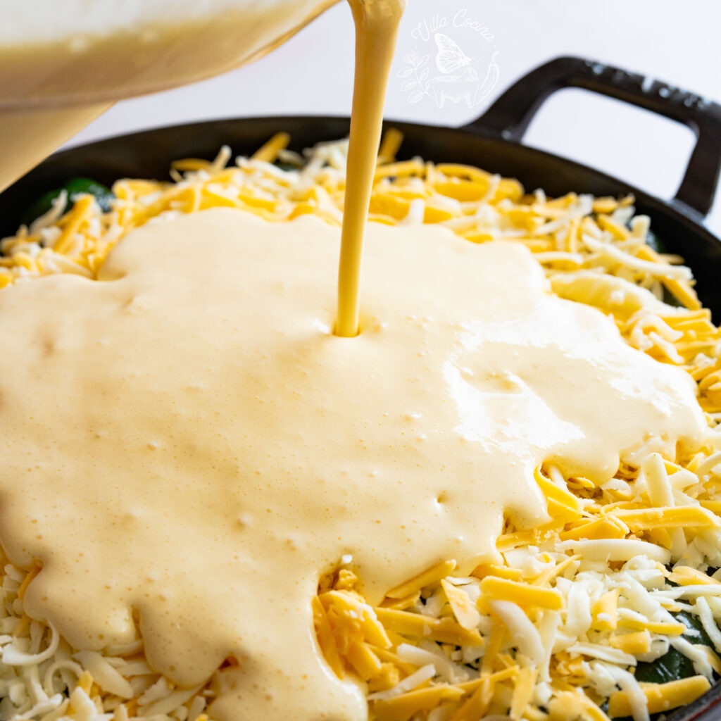 Batter being poured on a casserole dish