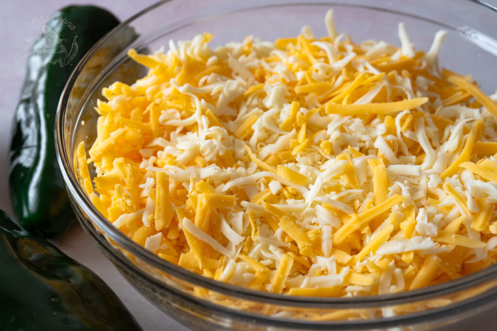 grated Oaxaca and yellow cheddar