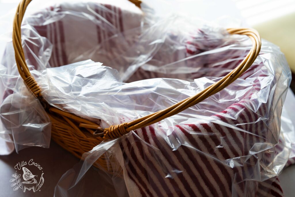 Basket covered with plastic for tacos de canasta.