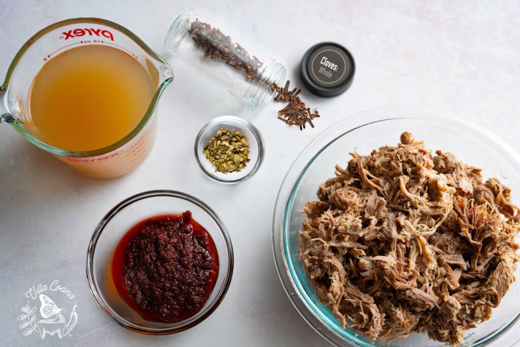 Pulled pork with, cumin, oregano, Broth, Chili paste