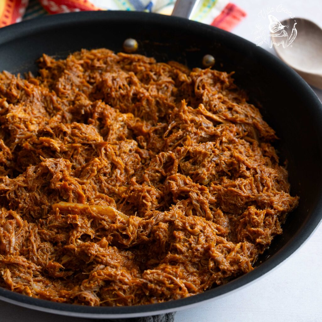 Pulled pork mixed with a chilli sauce for tacos de canasta.