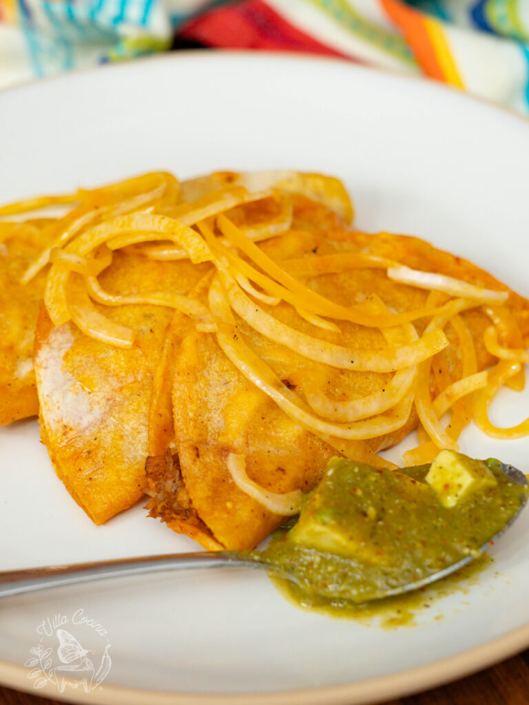 Tacos de canasta in a plate and ready to eat.