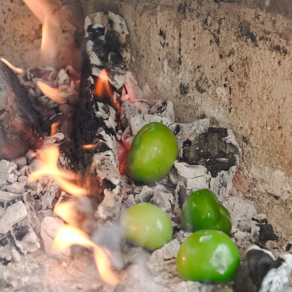 tomatillos roasted over an open fire