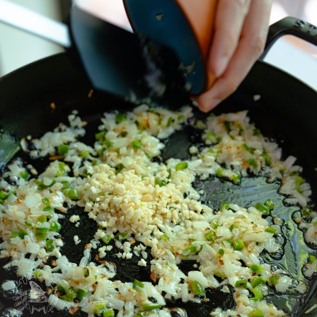 sautéing garlic along with onion and jalapeño 