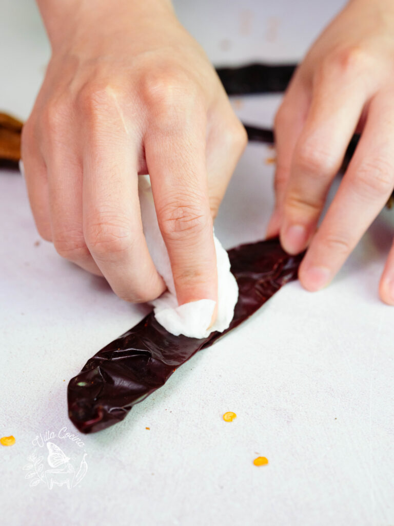 Wiping Clean Mexican Dried Peppers