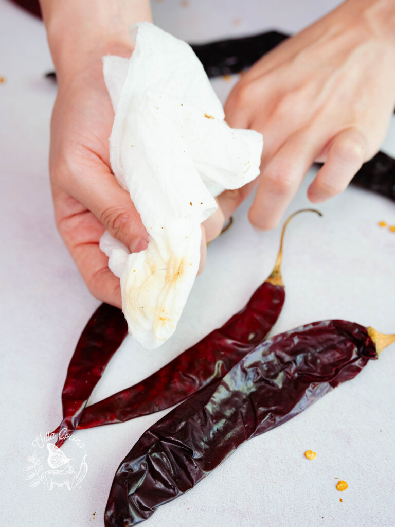 Wiping Clean Mexican Dried Peppers