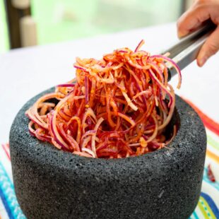 Red onions pickled in Salsa Macha