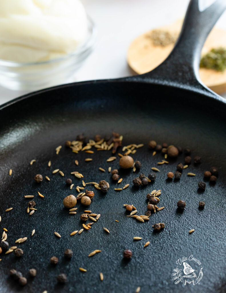 Toasting the ingredients for Adobo Sauce 