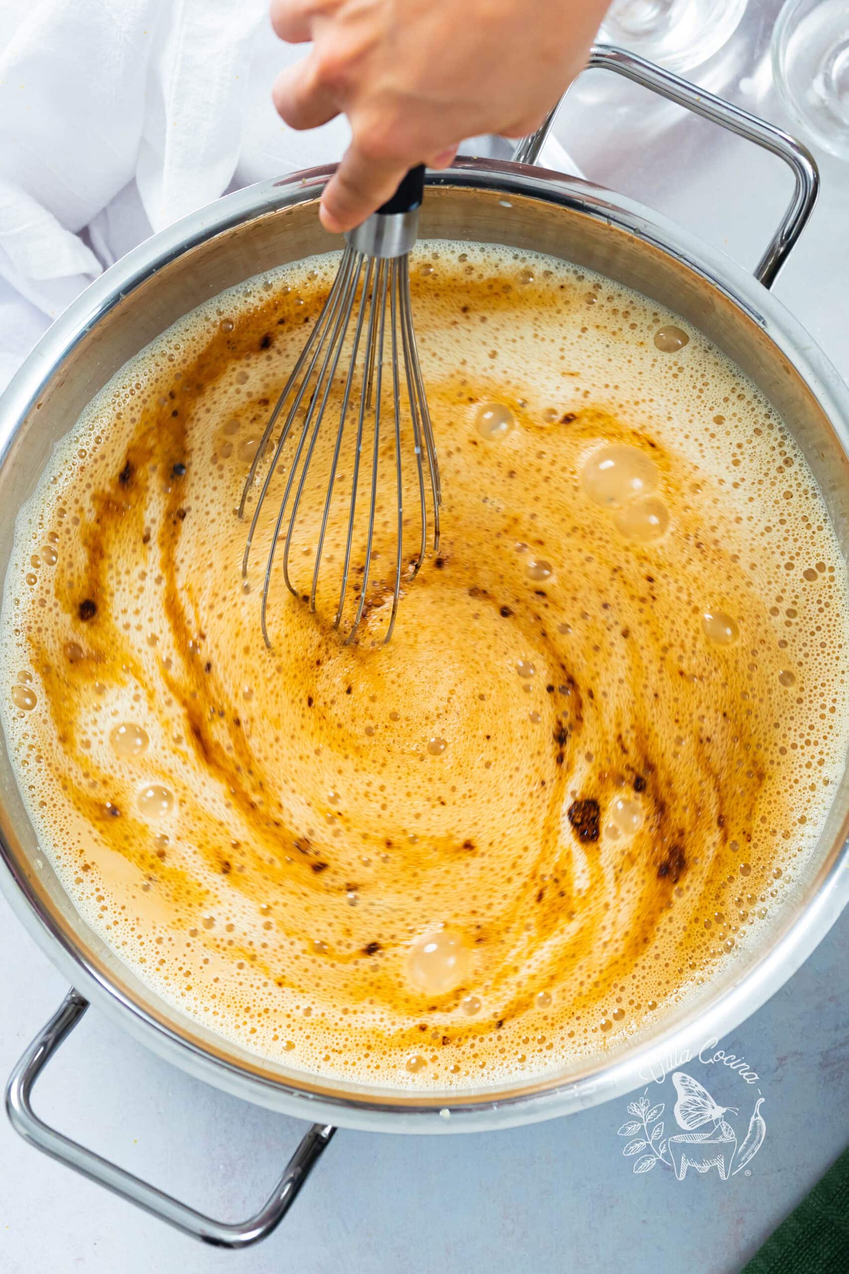 Mixing in coffee, cocoa powder, salt, and cornstarch slurry. 