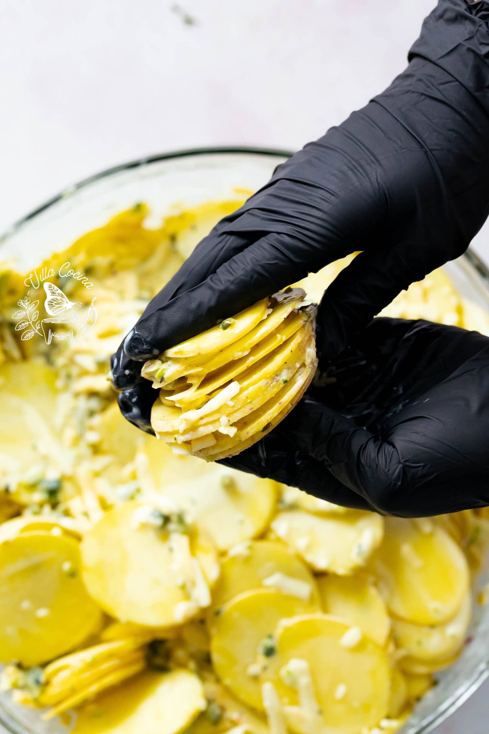 Thinly sliced potatoes stacked