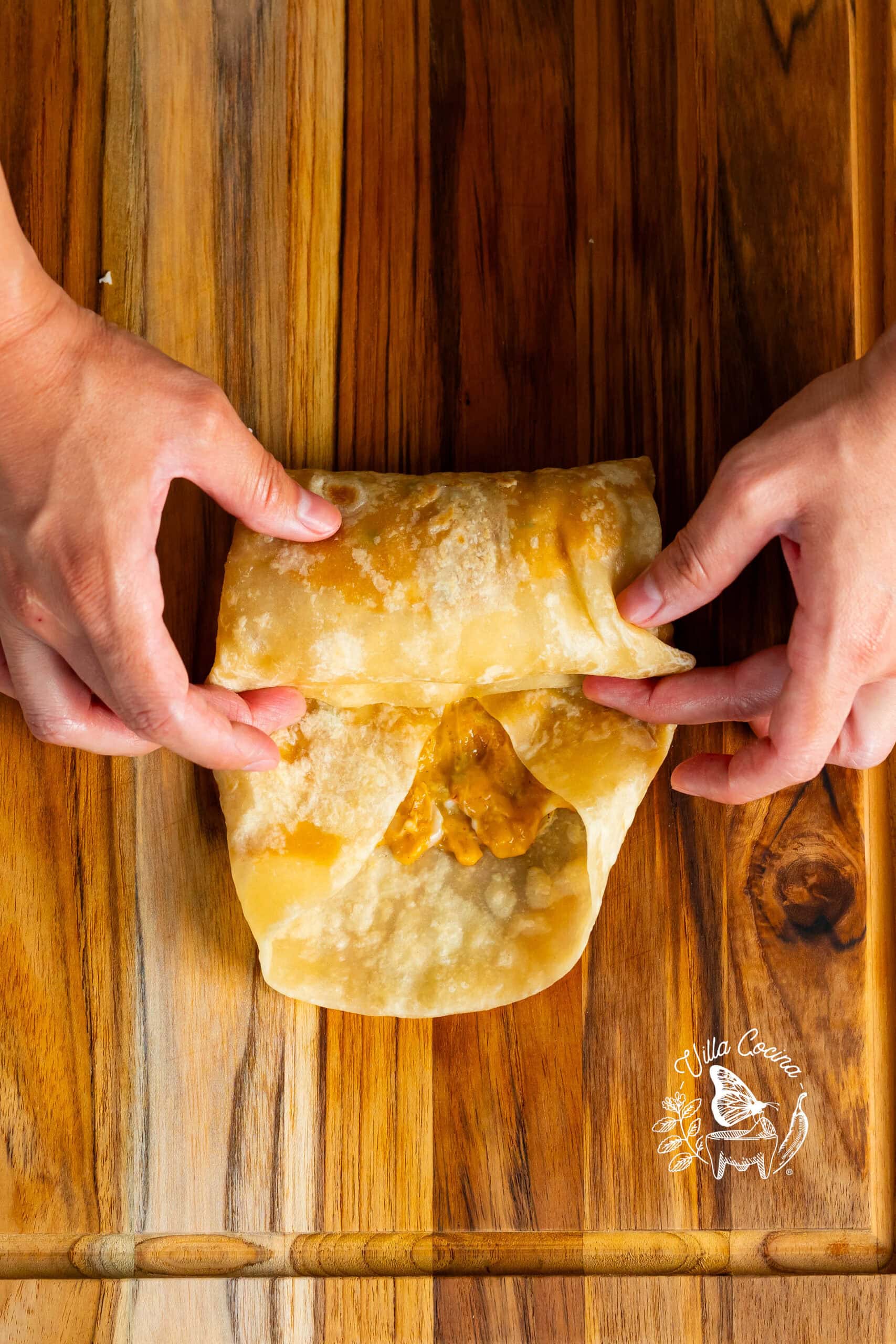 Making a burrito.