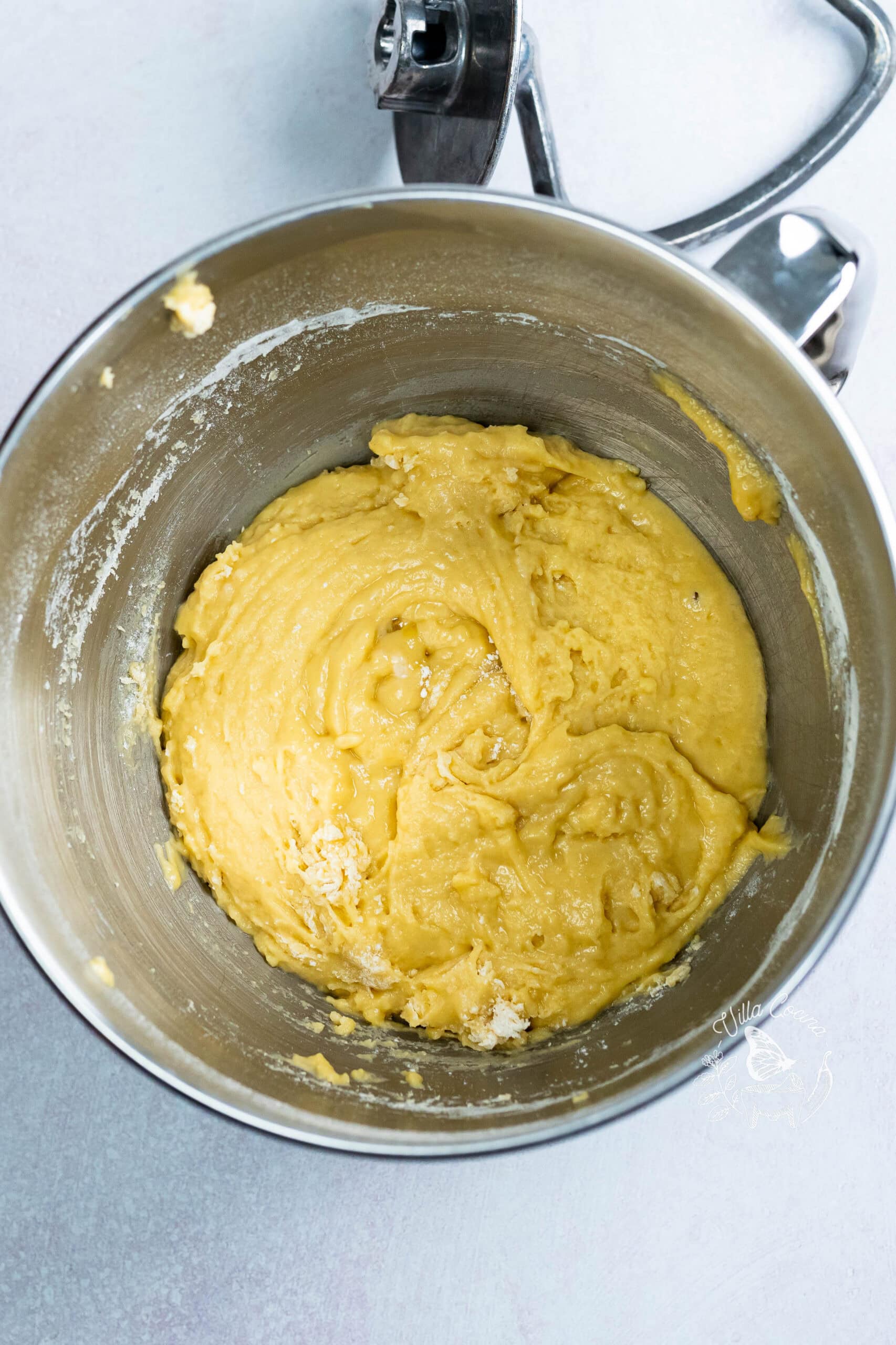 Concha dough beginning to form as flour is incorporated.